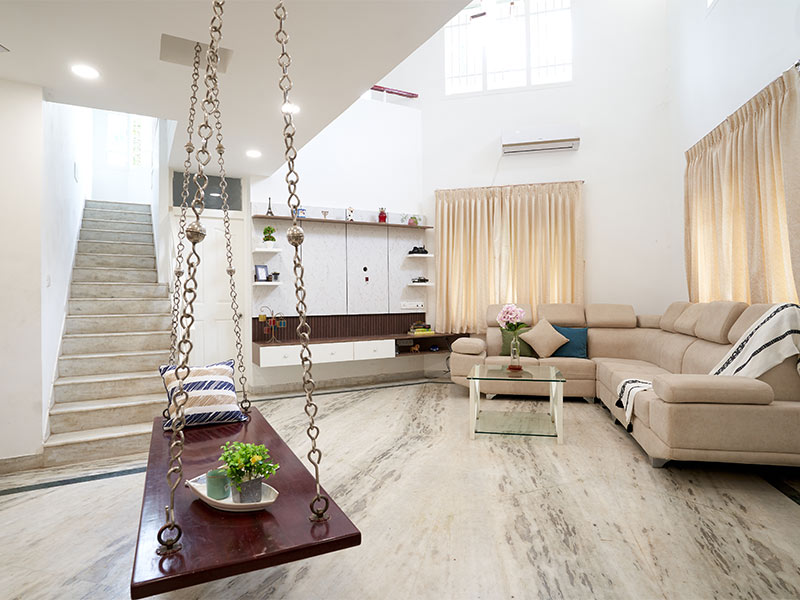 Double heighted living room with neutral colours for walls & furnishings - Beautiful Homes