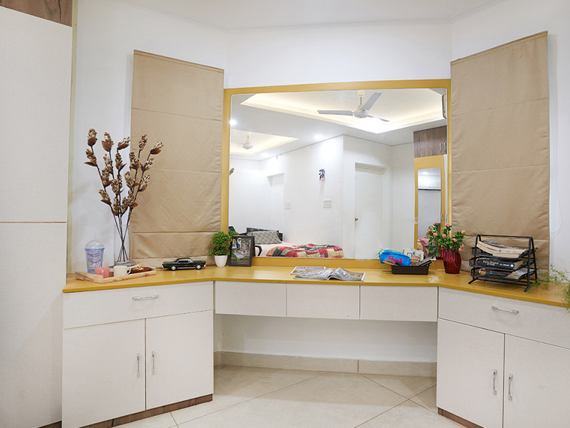 Neutral coloured dressing table counter with multiple storage options - Beautiful Homes