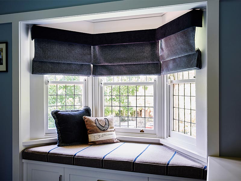 Corner seating near bay windows for small balcony furniture idea - Beautiful Homes