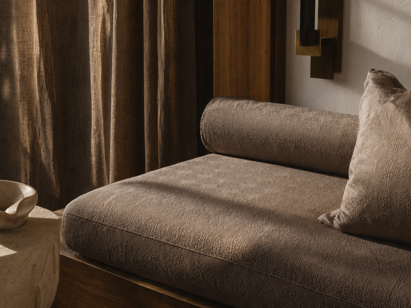 Plush earthy brown daybed with matching bolster and accent pillow - Beautiful Homes