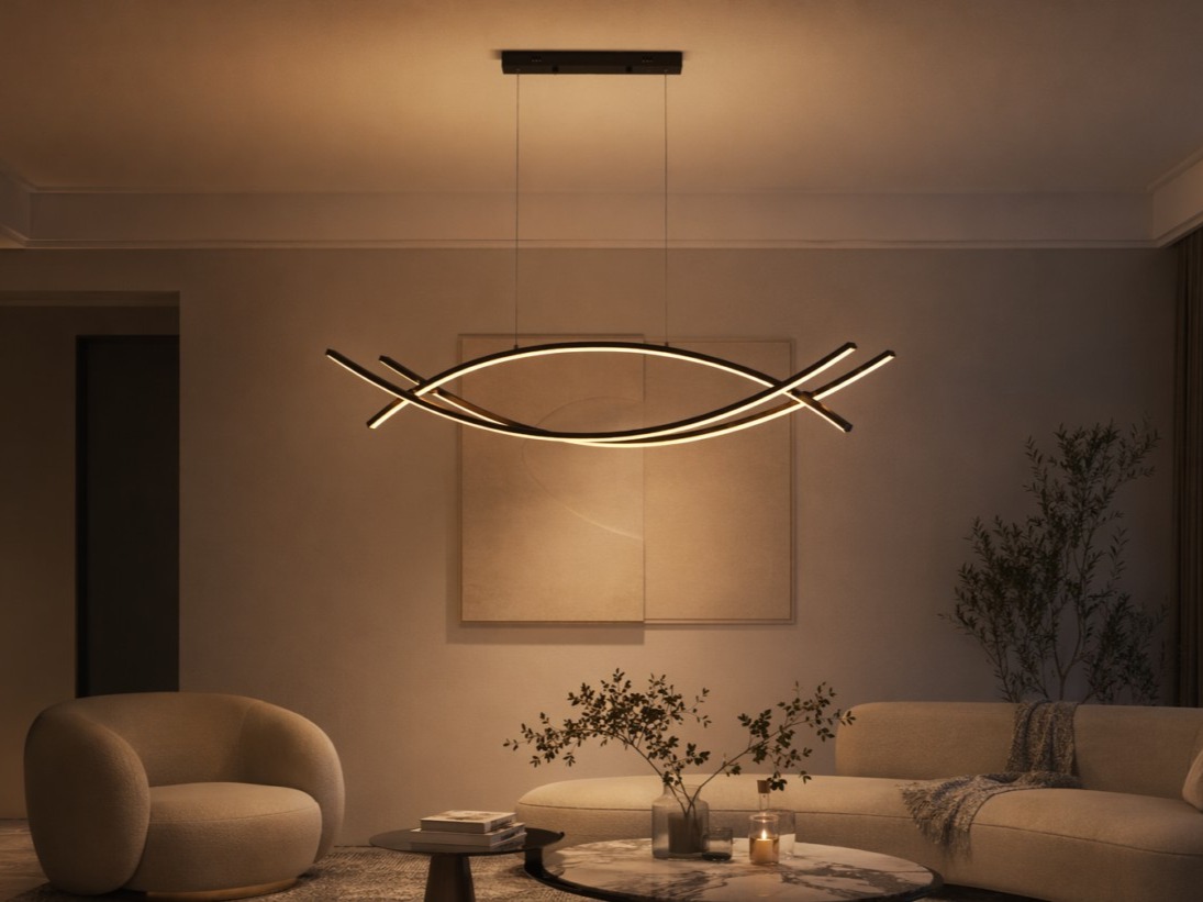 Black curved LED pendant light with a ribbon-like silhouette - Beautiful Homes