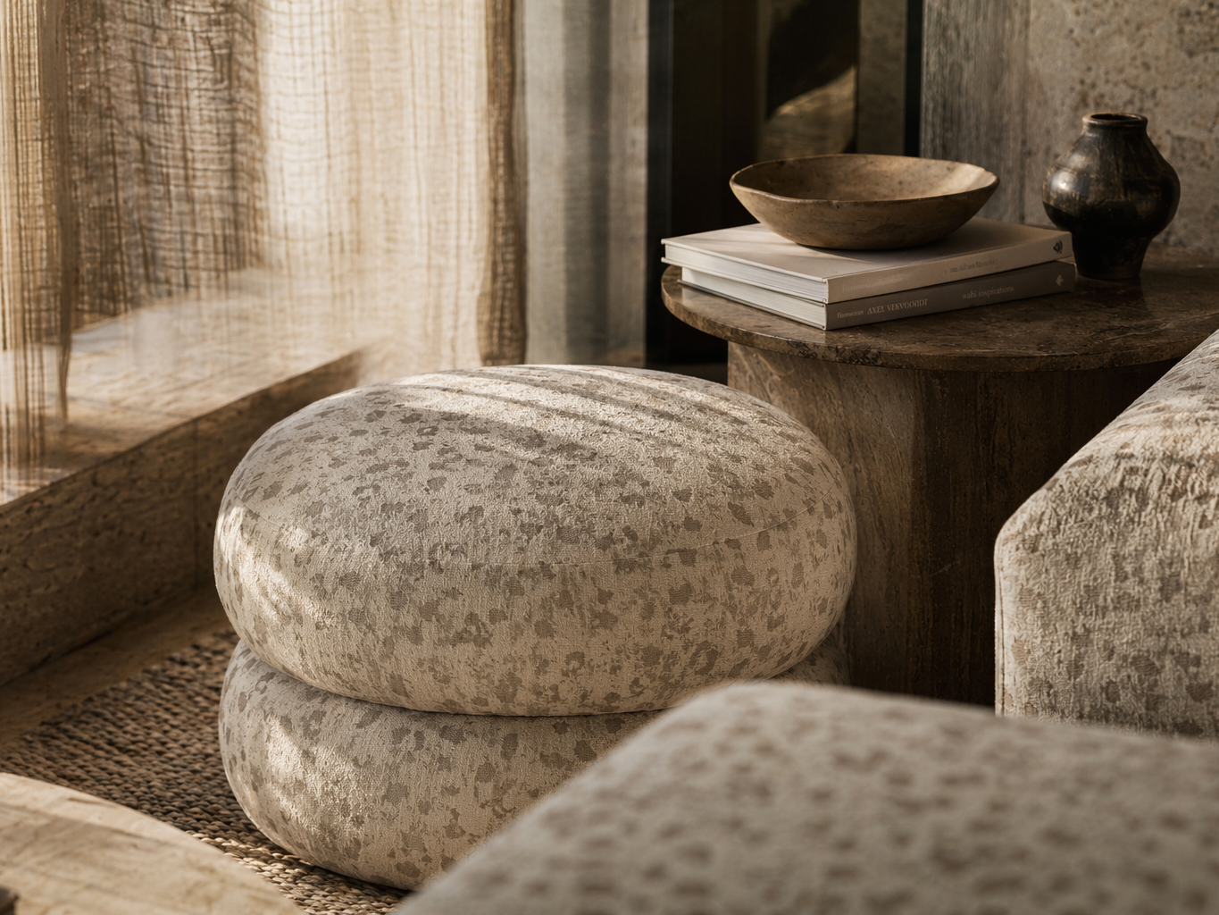 Soft upholstered poufs and seating in mottled beige fabric - Beautiful Homes