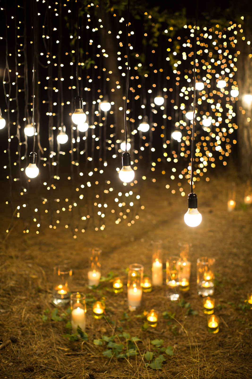 candles in tall jars or glass tubes for terrace interior design - Beautiful Homes
