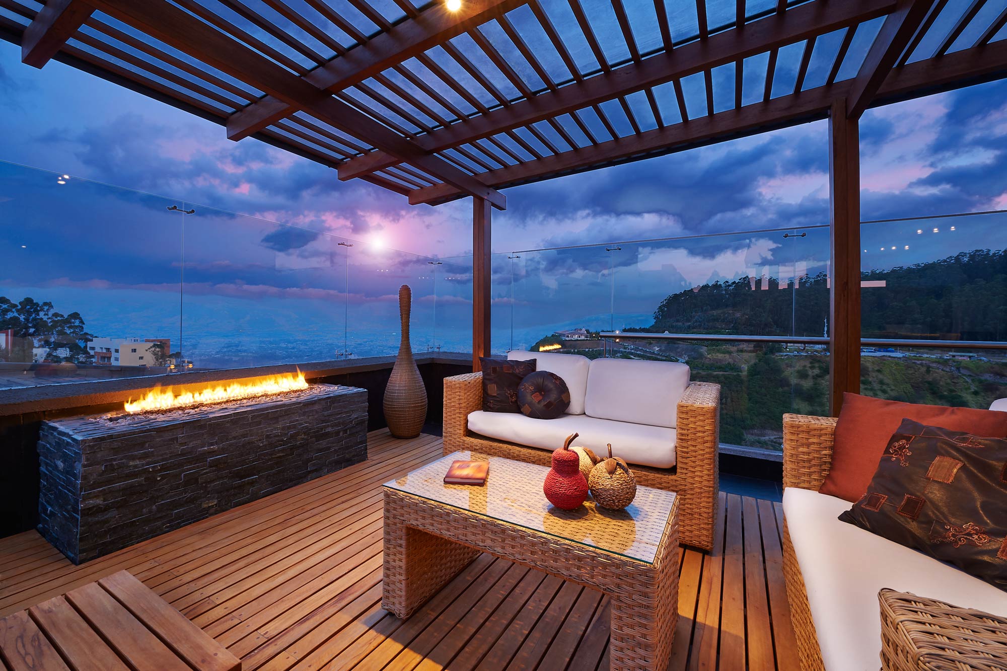Simple terrace design with glass panel  and slatted wooden flooring - Beautiful Homes