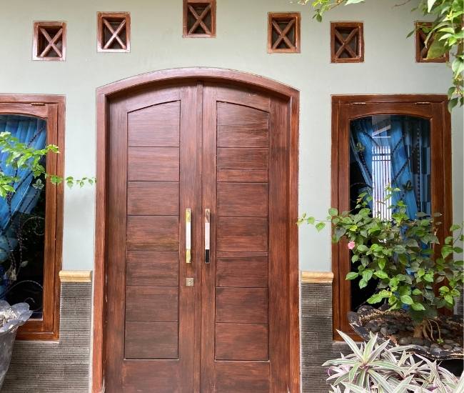 Teak wood door design for your home - Beautiful Homes