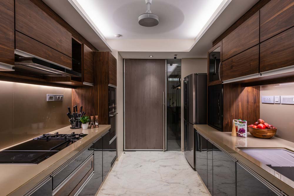 Wooden kitchen design with white flooring & ceiling - Beautiful Homes