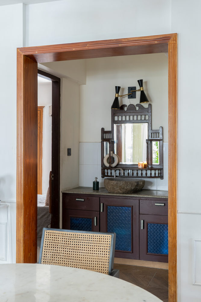 Passage that has a traditional mirror & vessel sink - Beautiful Homes