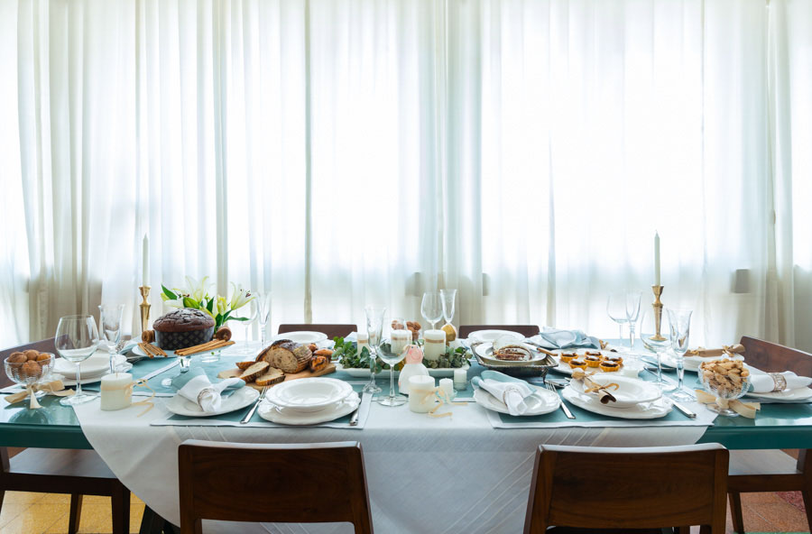 A table styled with crockery, cutlery and food - Beautiful Homes