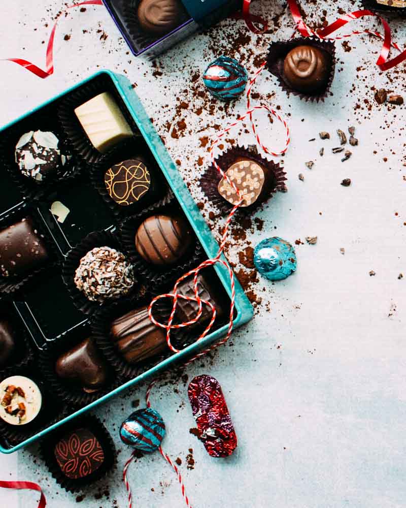 A blue box filled with chocolates
