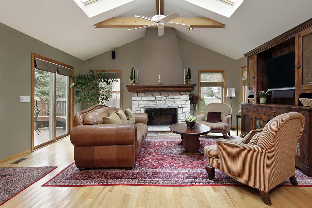 Ridge skylights bring in natural light & sky views from your living room design - Beautiful Homes